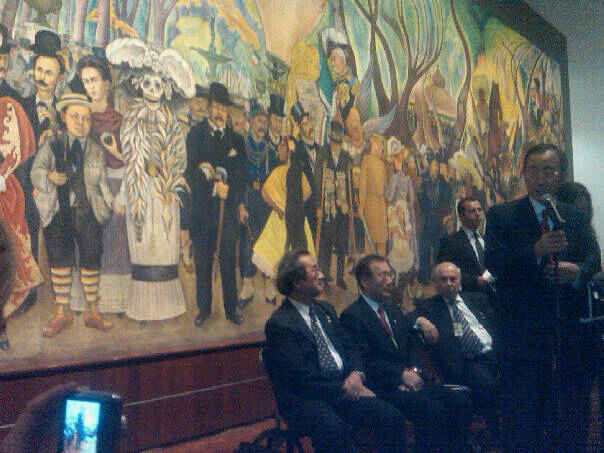 Paul Kawika Martin snaps picture of UN Secretary-General Ban Ki-Moon in front of Diego Rivera mural